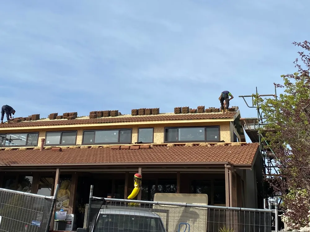 Roof tiling in progress, residential project